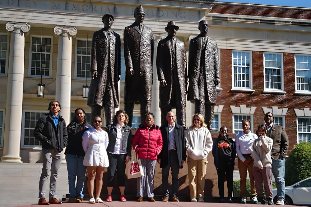 Students and faculty from Bard College, North Carolina A&amp;T, and Tuskegee University stand in front of a statue of the A&amp;T (Greensboro) Four on North Carolina Agricultural and Technical State University. Photo by Seamus Heady