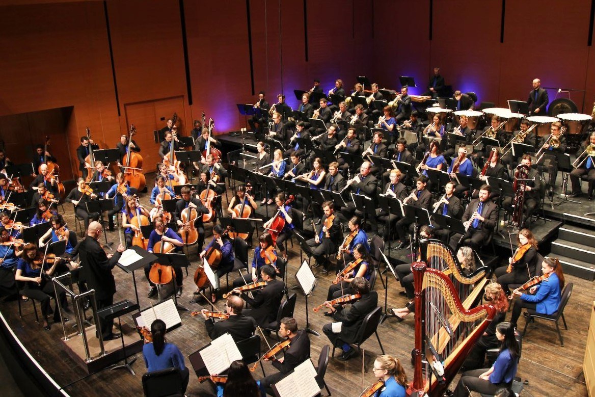 An orchestra seen from above.; Visit https://fishercenter.bard.edu/events/ton10-2/