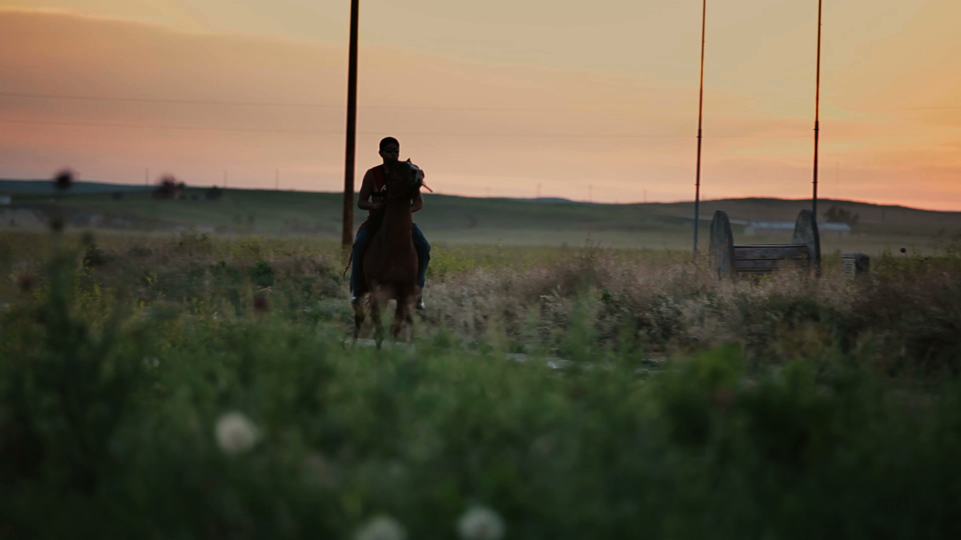 A person standing against a sunset.; Screening:&nbsp;Spaces of&nbsp;Exception