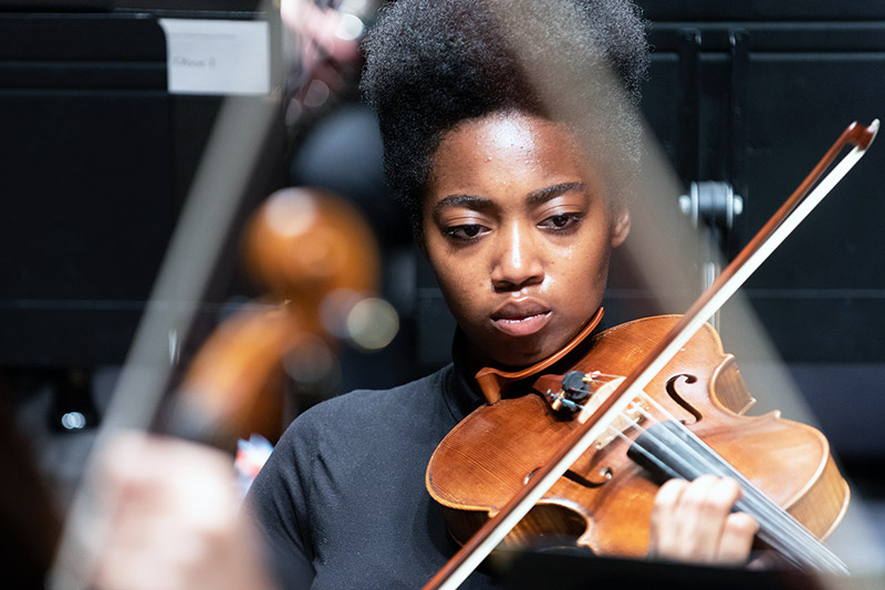 Student playing violin