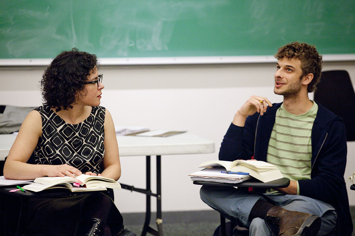 Professor and student discussion in calss.